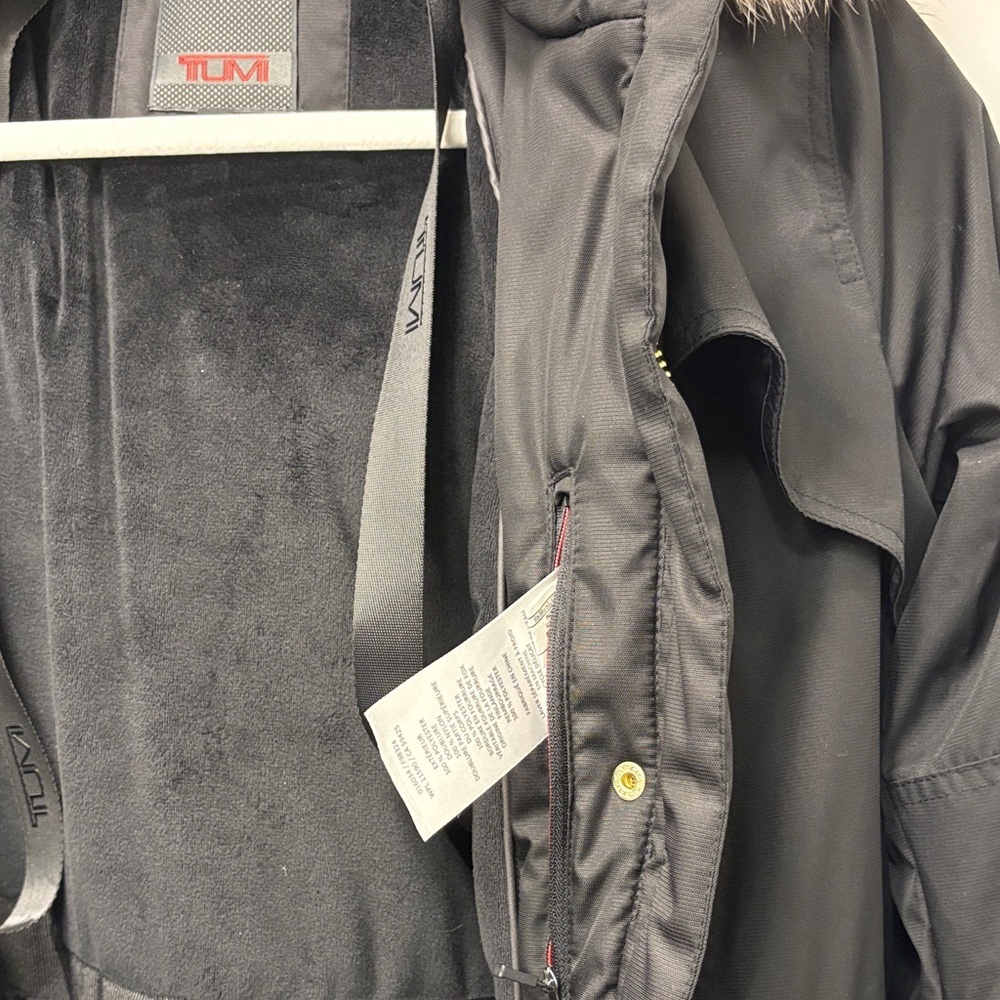 TUMI BLACK PUFFER COAT WITH TAN FUR TRIM. - Picture 4 of 16